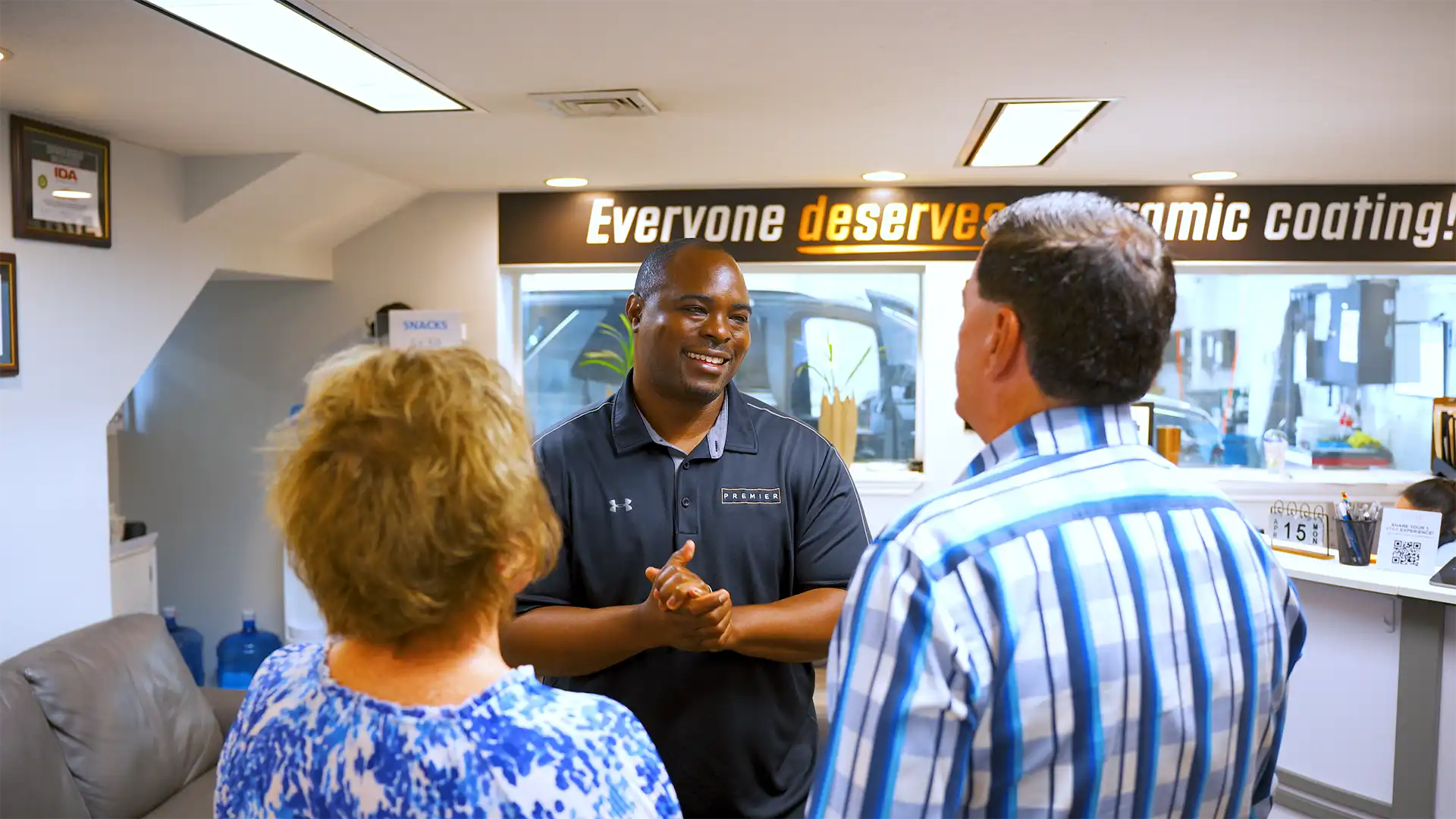 Donte talking with customers